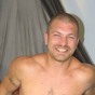 He looks a heck of a lot like Beckham, his sweet smile and tattooed body that you would just love to have wrapped around you. He