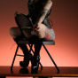 tattooed shaved guerilla girl corset high heels