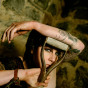 tattoo chick in heels chained in basement dungeon