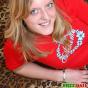 Comely blonde teen cutie Viola stripping and playing with a big pink dildo on the floor