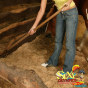 Horny Tyra in the horse shed pushes a dildo into her pussy