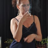 Sexy Smoking Mina in blue dress stripping