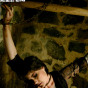 tattoo chick in heels chained in basement dungeon