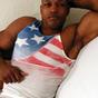 Sexy bald black man plays with his bulging love rod