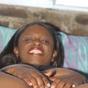 Ebony wife squeezes her nips